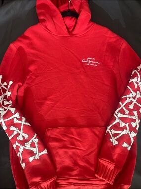 AMIRI Red Crewneck Sweatshirt with White Bone Sleeve Graphics